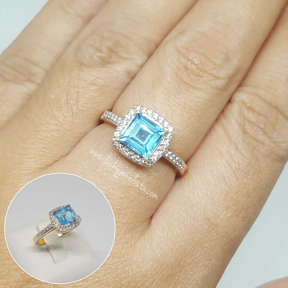 แหวนพลอยบลูโทแพซ Blue topaz สีฟ้าสดใสทรงสี่เหลี่ยมล้อมเพชร 1