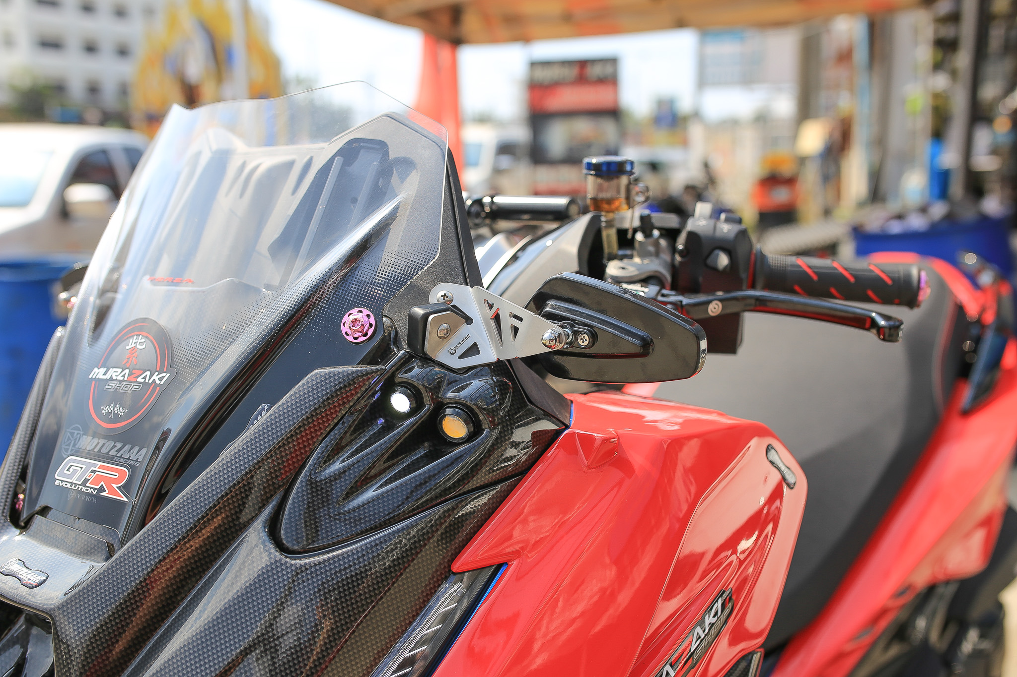 กระจกยึดข้างชิวหน้าพร้อมขายึดสแตนเลส Revolution