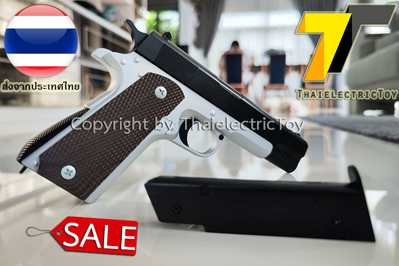 ปืนอัดลมเหล็ก Colt 1911 ขนาดเล็ก ชักยิงทีล่ะนัด สีทูโทน ลำกล้องยาว 6.5 นิ้ว นกสับได้ เซพตี้สไลน์ หนัก 371 กรัม ใช้ลูกกระสุนพลาสติก 6 มิล