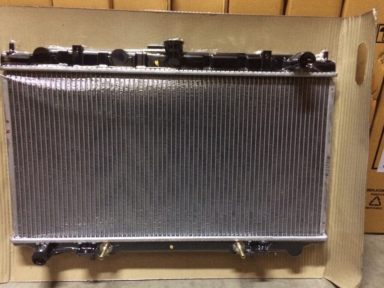 หม้อน้ำรถยนต์ Nissan Primera