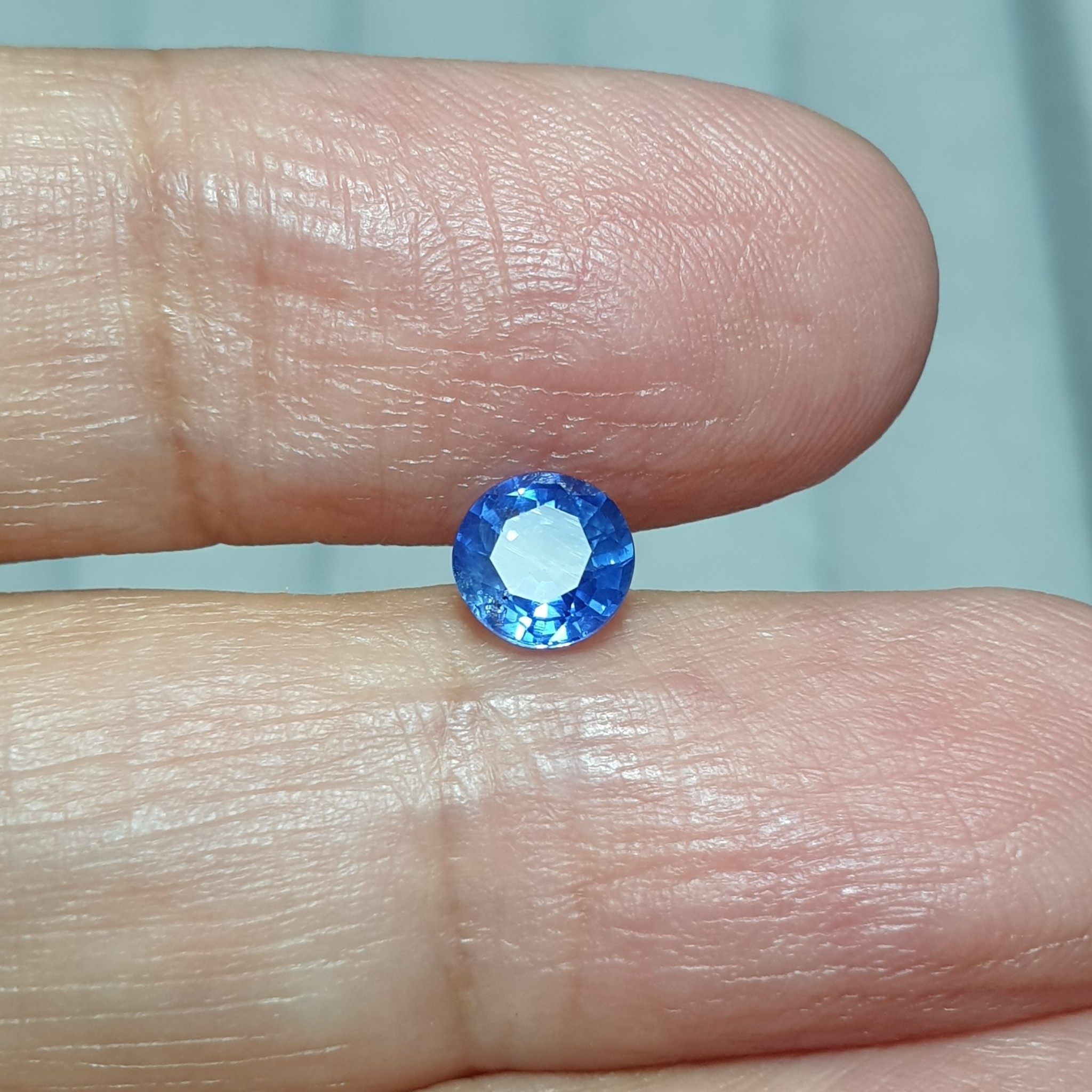 พลอยไพลิน ซีลอน Blue Sapphire เผาเก่า corn flower 0.75 กะรัต เผาเก่า