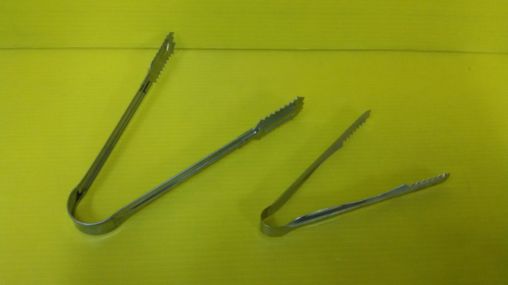 คีบน้ำแข็ง (ล)