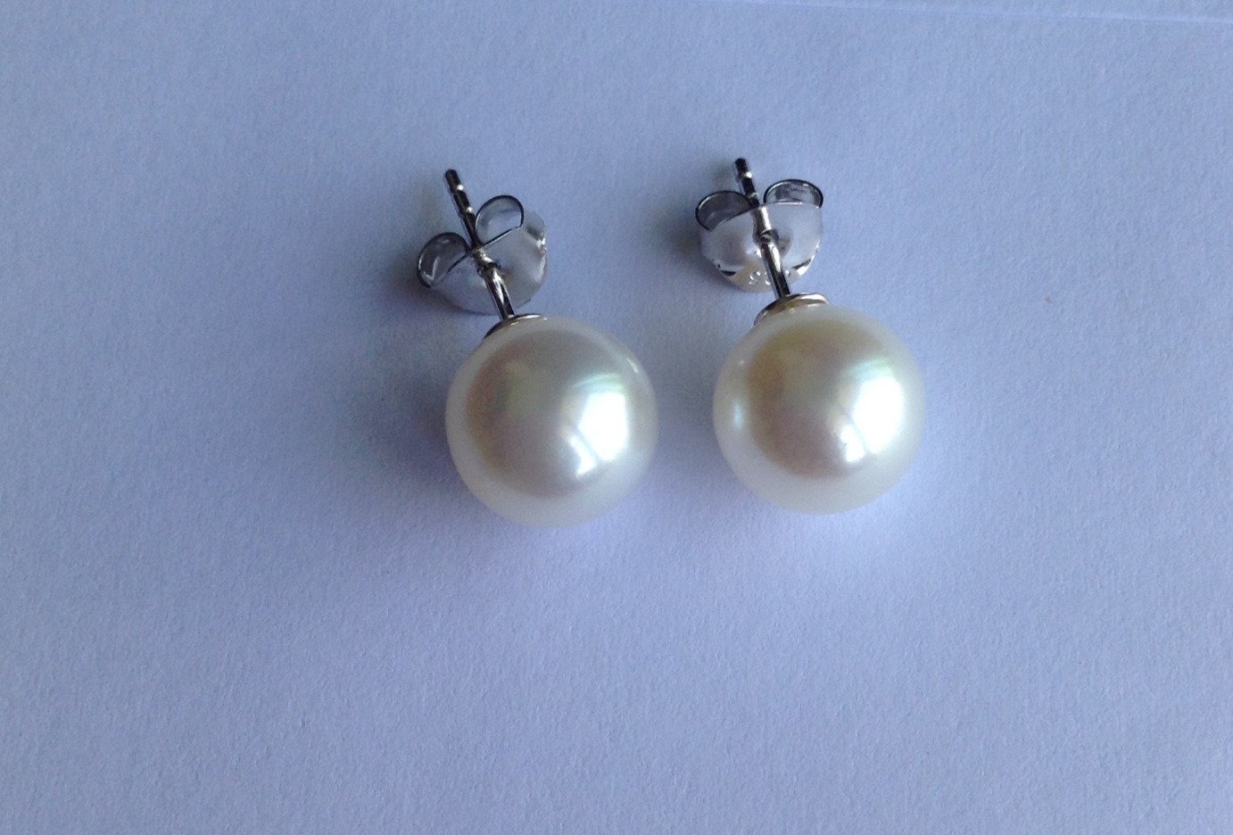 ต่างหูไข่มุกน้ำจืด 10.5-11 มิล กลม สีขาว กลม เงามาก เกรด AAA ตัวเรือนเงินชุบทองคำขาว