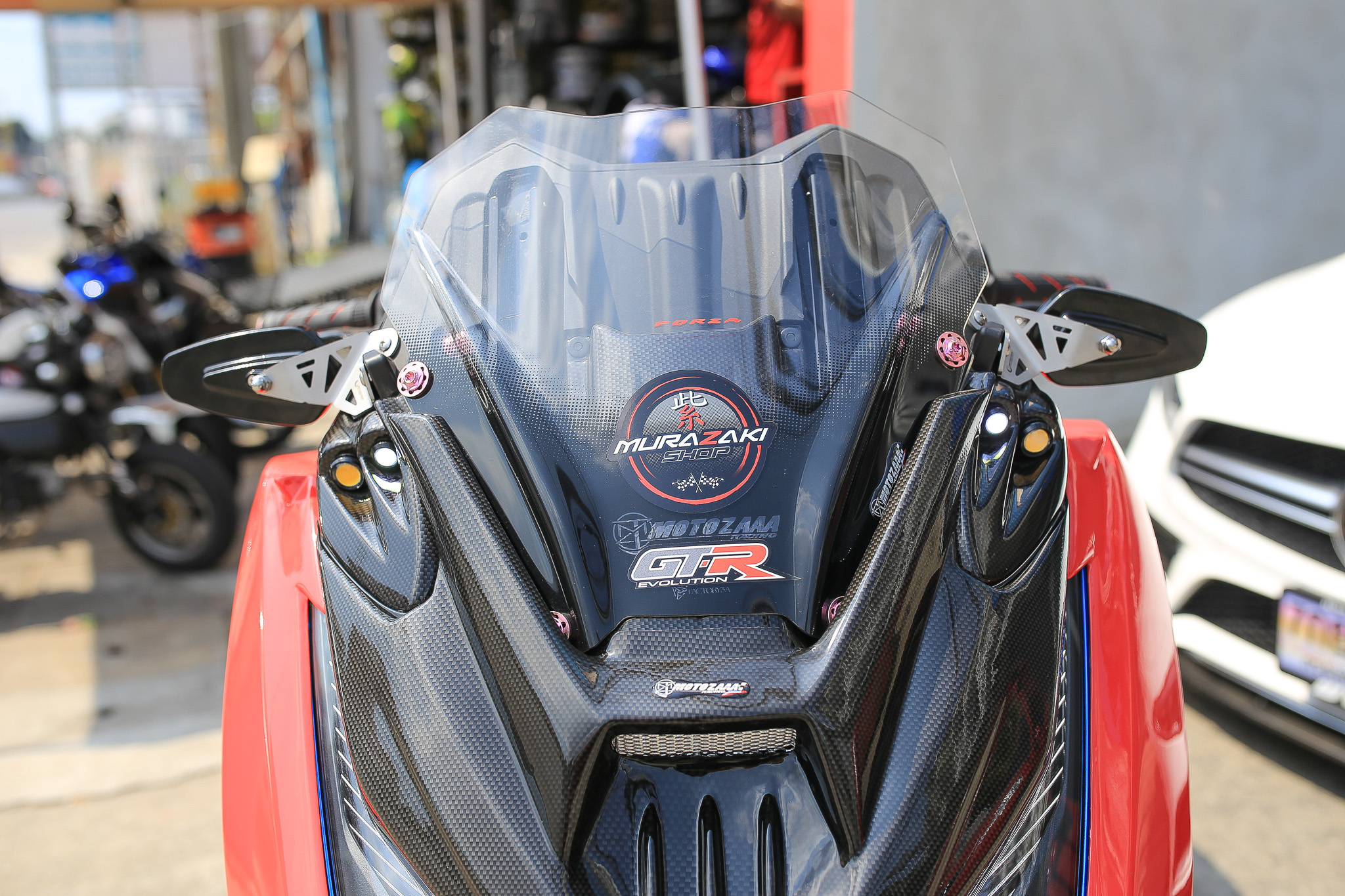 กระจกยึดข้างชิวหน้าพร้อมขายึดสแตนเลส Revolution