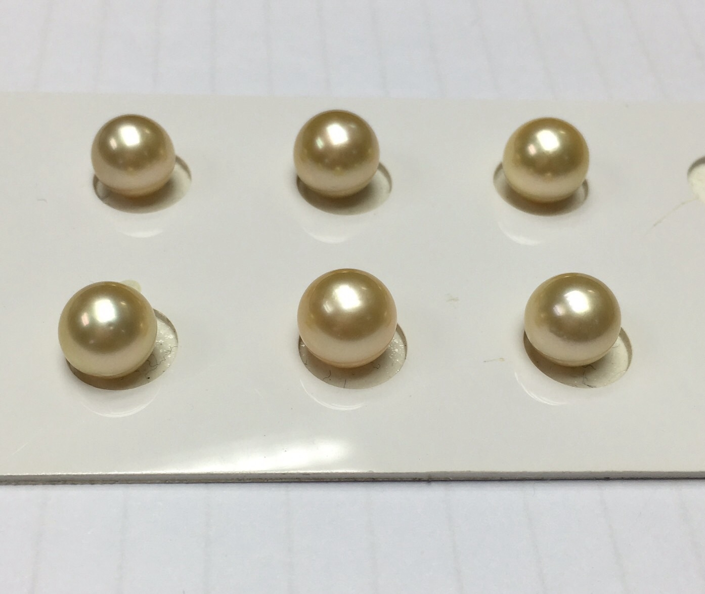 ไข่มุกเม็ดเดี่ยวคู่ south sea ขนาด 9-10 มิล กลม สีทอง เกรด AAA