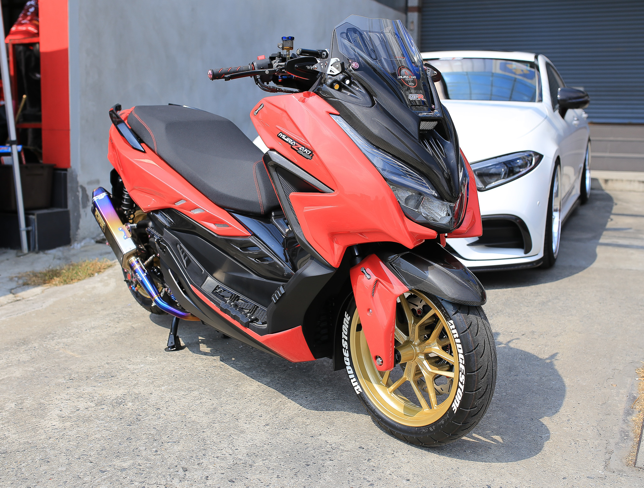 กระจกยึดข้างชิวหน้าพร้อมขายึดสแตนเลส Revolution