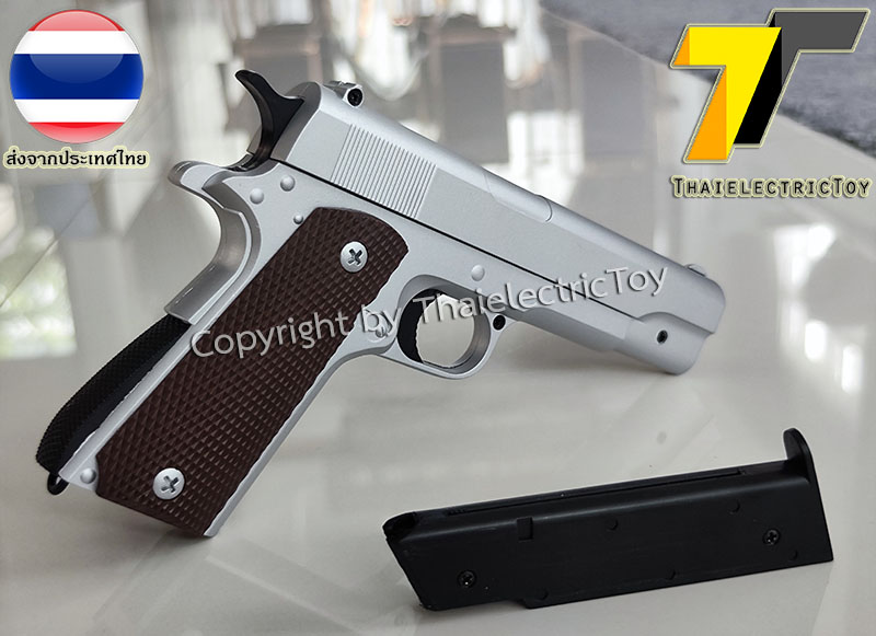 ปืนอัดลมเหล็ก Colt 1911 ขนาดเล็ก ชักยิงทีล่ะนัด สีบอร์นเงิน ลำกล้องยาว 6.5 นิ้ว นกสับได้ เซพตี้สไลน์ หนัก 371 กรัม ใช้ลูกกระสุนพลาสติก 6 มิล