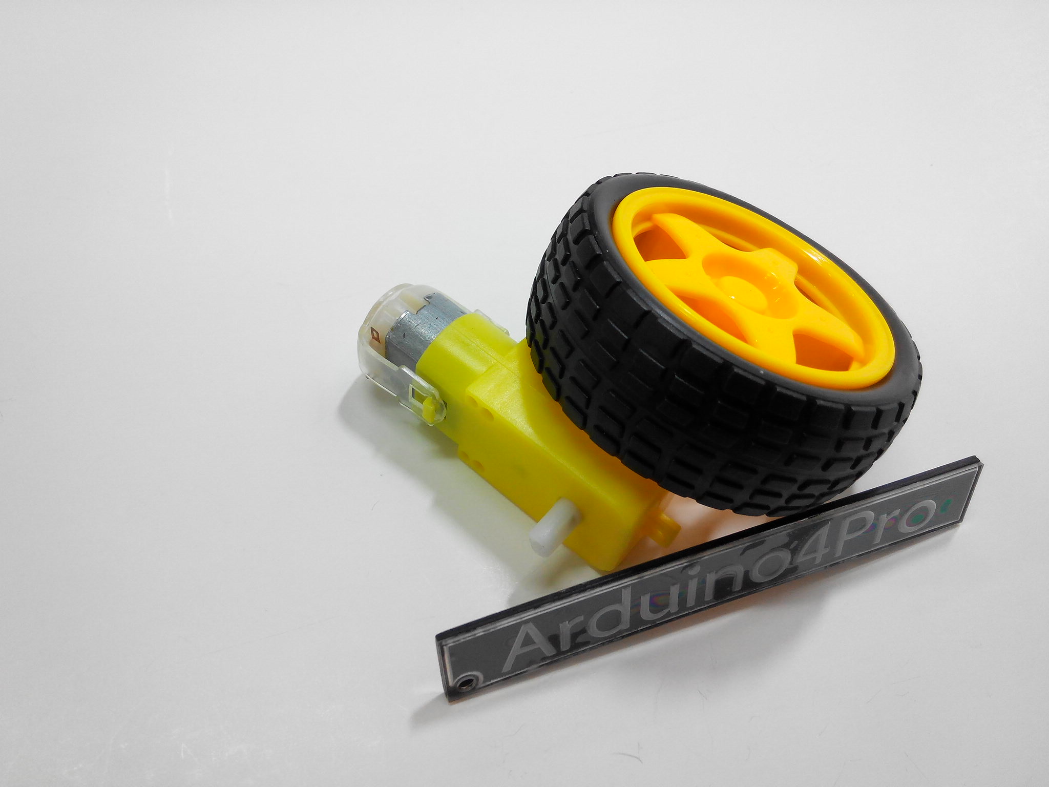 DC motor and supporting wheels