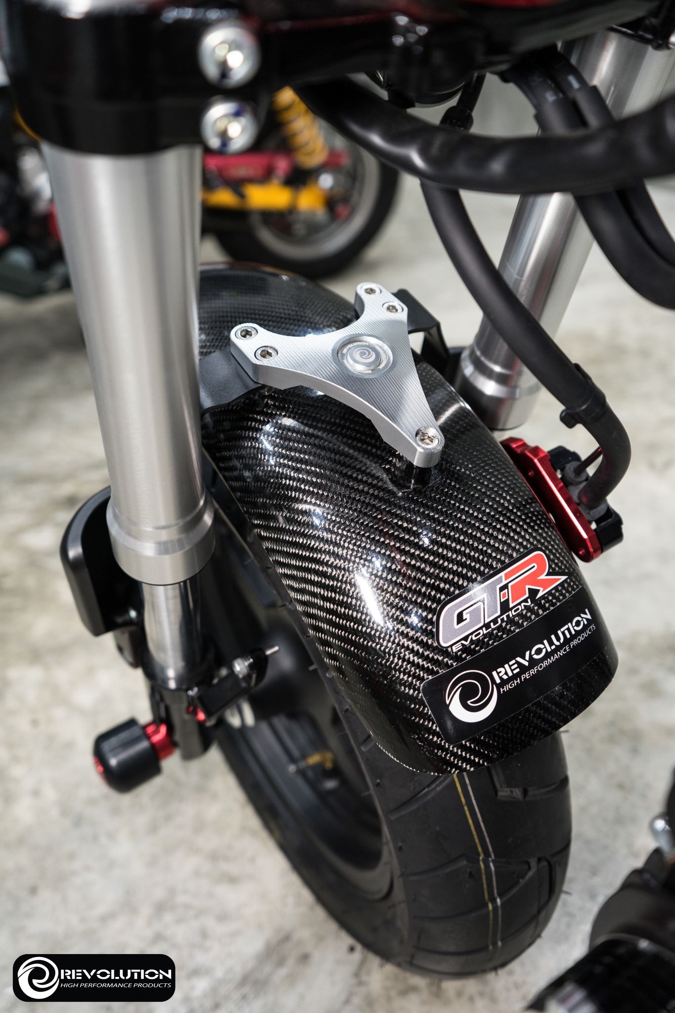 ชุดโหลดบังโคลนหน้า REVOLUTION ST-125Dax/MONKEY-125 (4-5เกียร์) - เงิน - แดง - ดำ ราคา 1,650 บาท/ชุด