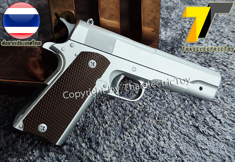 ปืนอัดลมเหล็ก Colt 1911 ขนาดเล็ก ชักยิงทีล่ะนัด สีบอร์นเงิน ลำกล้องยาว 6.5 นิ้ว นกสับได้ เซพตี้สไลน์ หนัก 371 กรัม ใช้ลูกกระสุนพลาสติก 6 มิล