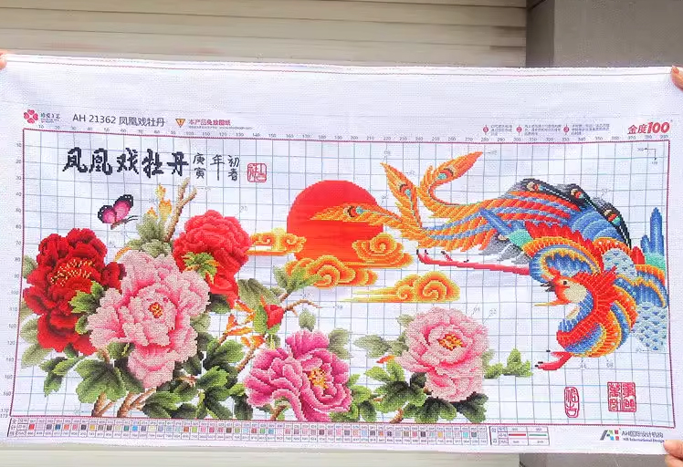 phoenix-1101 *สินค้าหมด* ชุดปักครอสติช ลายหงส์ฟินิกซ์กับโบตั๋น (ผ้า11CTพิมพ์ลาย ปัก 3 เส้นเล็ก) ขนาด 103*50 ซม.ผ้าครอสติช 11CTพิมพ์ลายปักบนผ้า+ไหมคอตตอน 54 สี+ผังลาย+เข็ม