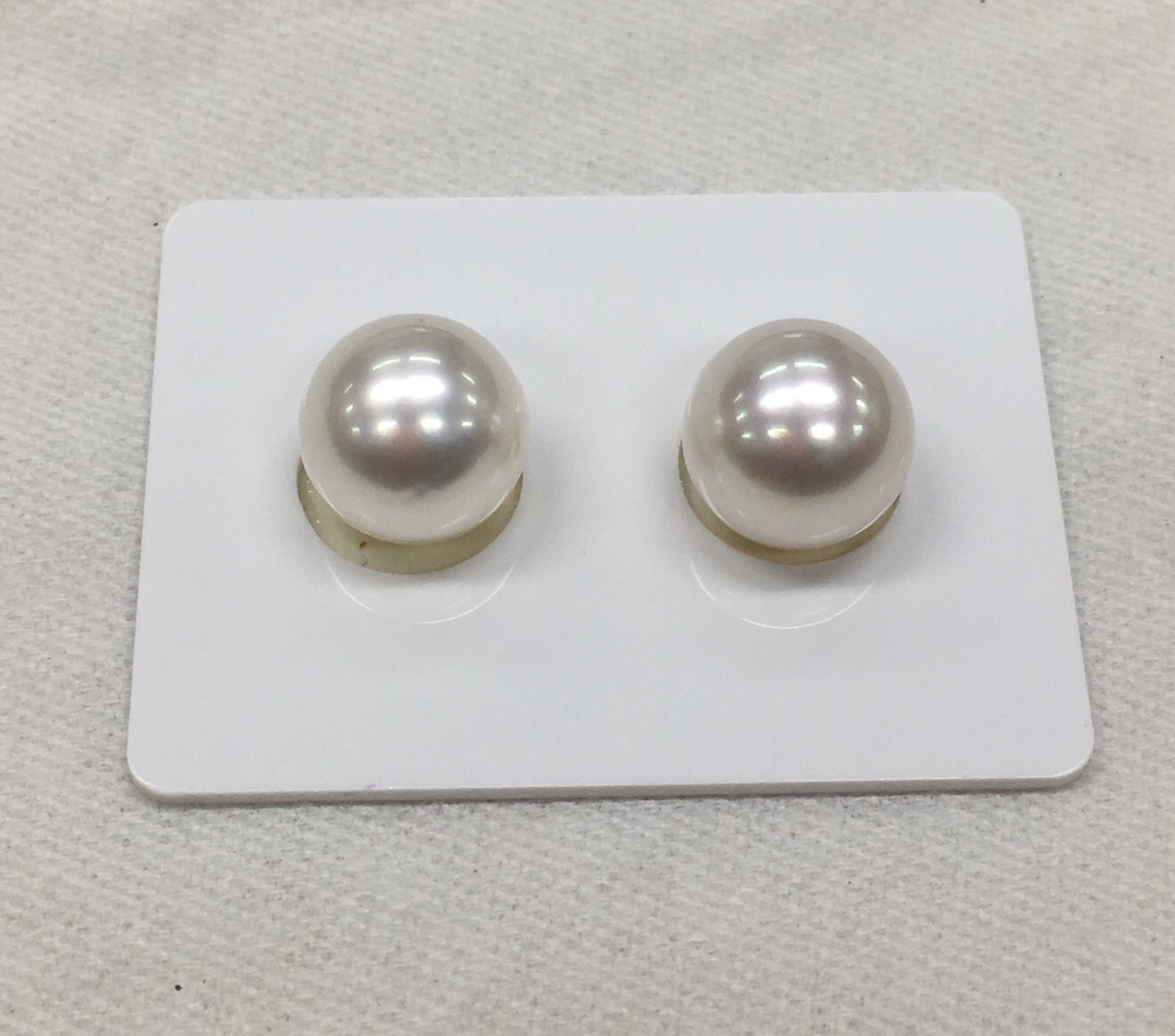 ต่างหูไข่มุก south sea ขนาด 10-11 มิล สีขาวอมชมพู เกรด AA++ ก้าน 14k