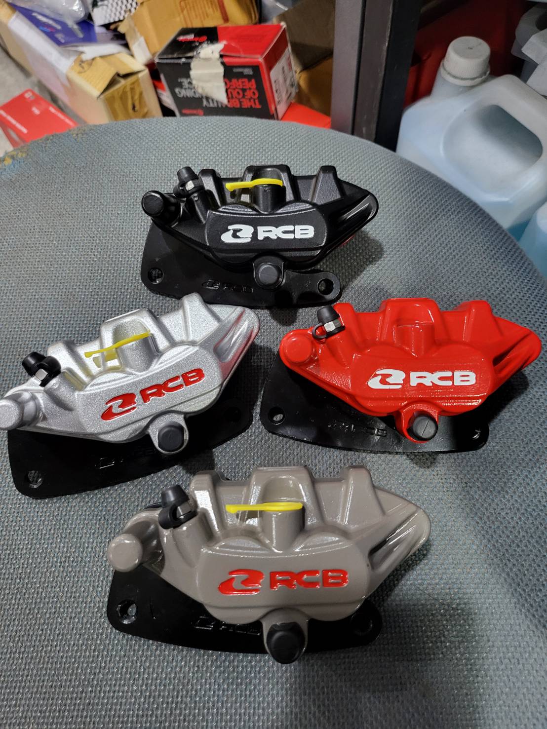 ปั้มล่าง RACINGBOY ขาจับ ใส่จานเดิม GIORNO+รุ่น ABS CLICK 125-150 160ตัวไม่มีABS ราคา1300 มีสีแดง เงิน เทา ดำ