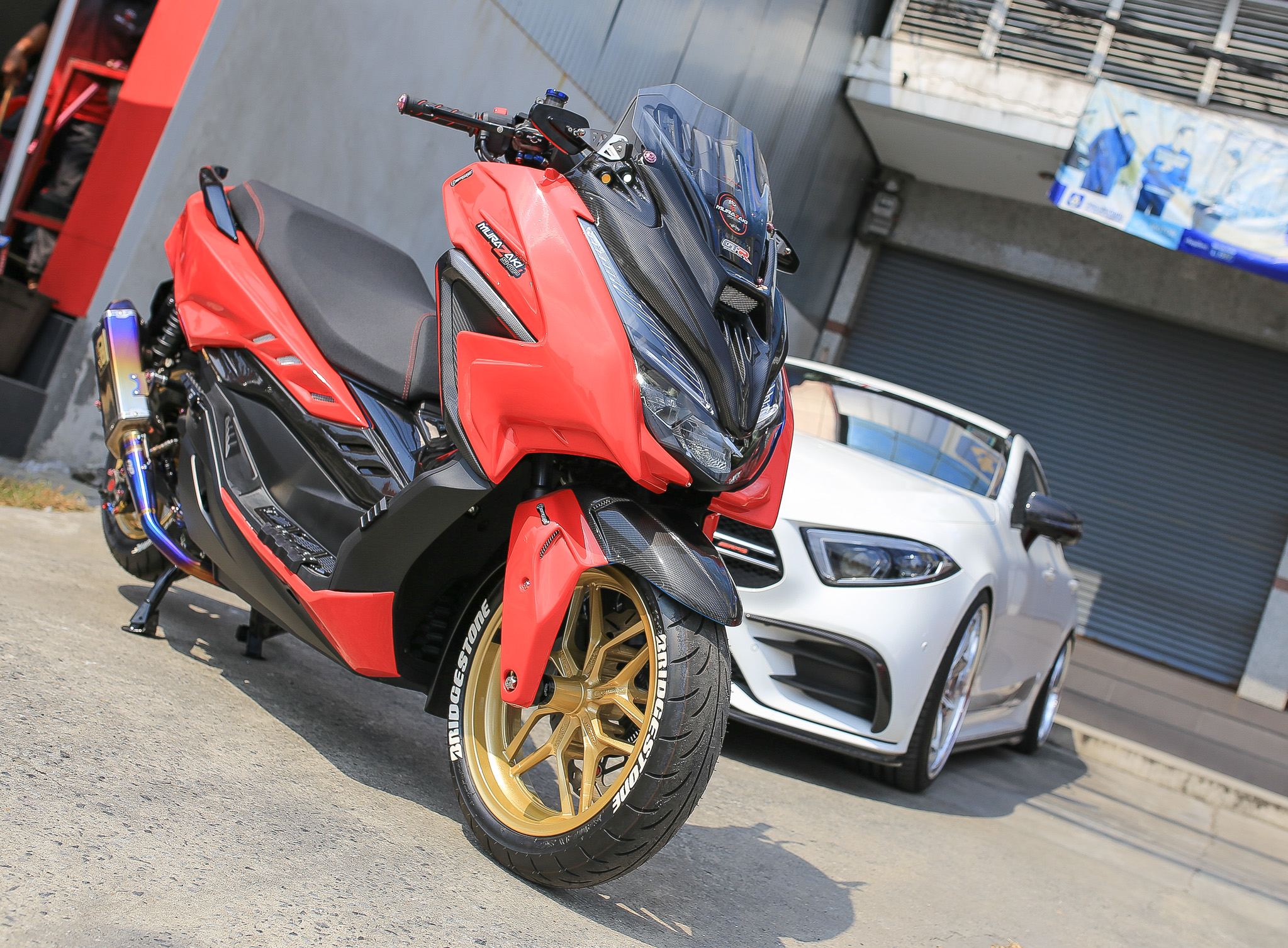 กระจกยึดข้างชิวหน้าพร้อมขายึดสแตนเลส Revolution