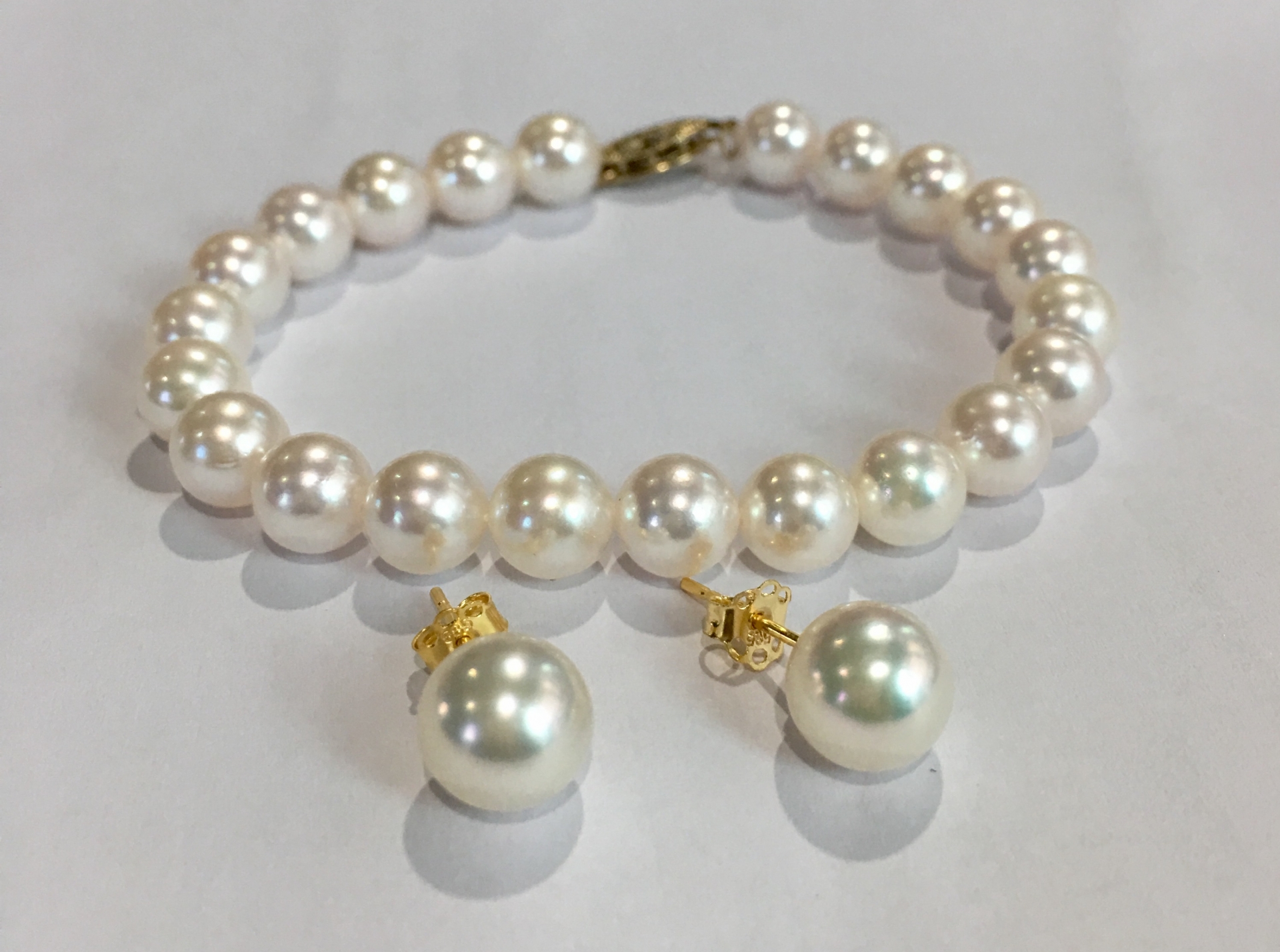 เซ็ตสร้อยข้อมือและต่างหูไข่มุกอะโกย่าญี่ปุ่นแท้ กลม ก้านทอง 14k