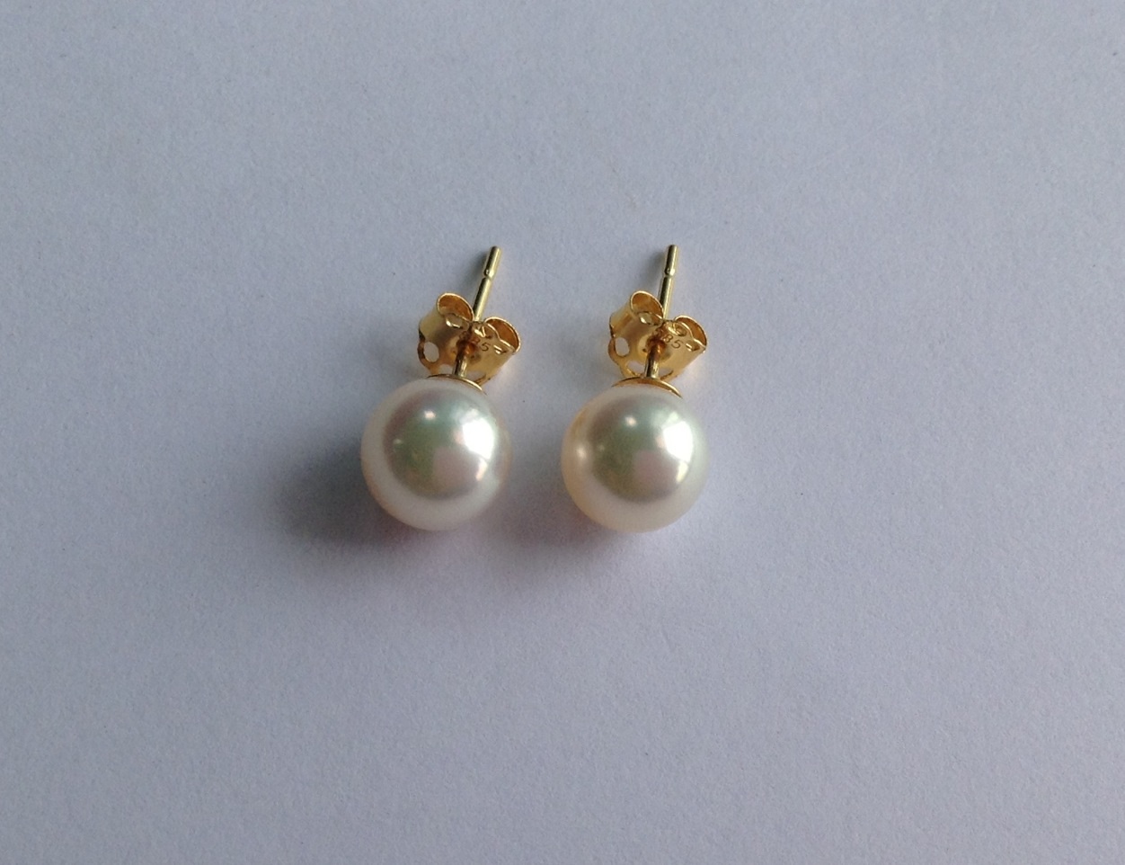 ต่างหูไข่มุกอะโกย่าญี่ปุ่นแท้ 7-7.5 มิล กลม สีขาวอมชมพู ตัวเรือน 14k