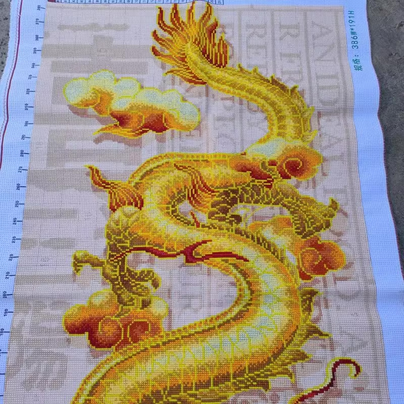 dragon-1102 *สินค้าหมด* ชุดปักครอสติช ลายมังกรทอง (รุ่นไหมเงา silk ปักเต็มผืนผ้า ไม่มีเดินเส้น ผ้า11CTพิมพ์ลาย ปัก 3 เส้นเล็ก) ขนาด 100*55 ซม.ผ้าครอสติช 11CTพิมพ์ลายปักบนผ้า ไหมเงา silk 21 สี ผังลาย เข็ม