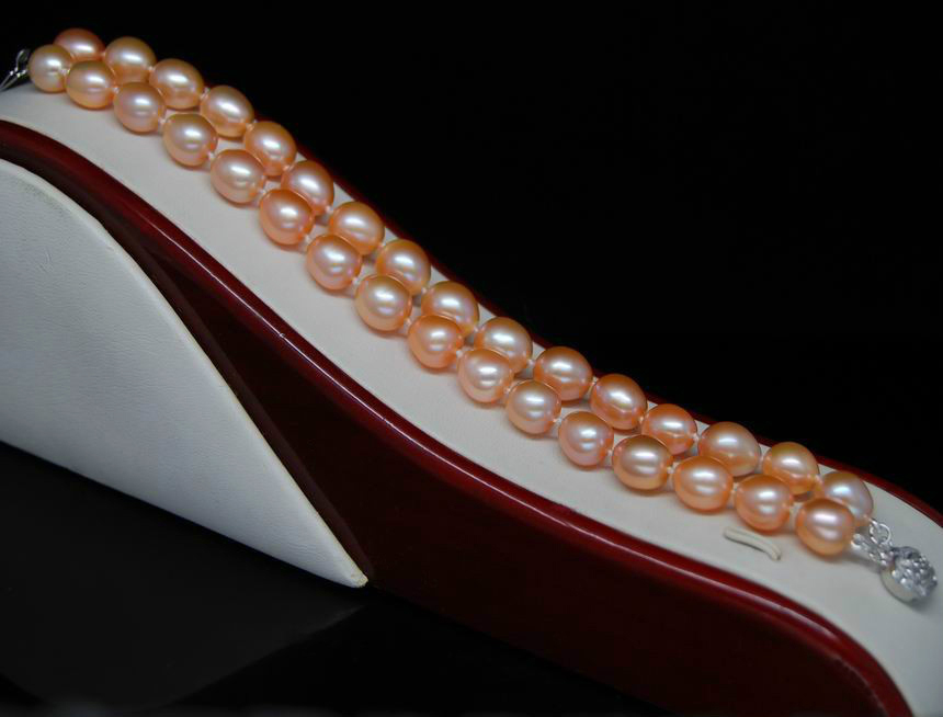 สร้อยข้อมือไข่มุกแท้ แบบ 2 ชั้น มุกรี สีส้ม 8.5x9 มิล