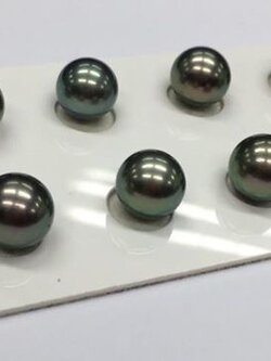 ไข่มุกเม็ดคู่ south sea ขนาด 10-11 มิล กลม สีดำอมเขียวเข้ม สีเกรด AAA