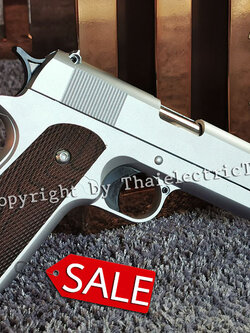 ปืนอัดลมเหล็ก ชักยิงทีล่ะนัด Colt 1911 สีบอร์นเงิน ลำกล้องยาว 7.5 นิ้ว นกสับได้ เซพตี้สไลน์ แมคเหล็ก หนัก 579 กรัม ใช้ลูกกระสุนพลาสติก 6 มิล