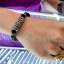 ตะกรุดหลวงพ่อเปิ่นใส่ในปลอกตะกรุดเงินแท้ ร้อยหินนิลดำเงาสวยๆ ขนาดหิน 10 mm NSSV2477