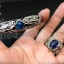 กำไลข้อมือเงินแท้ ลายมังกรฝังพลอยสีฟ้าไพลิน หลังเบี้ย Sterling Silver 925 NSBL2469