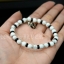 สร้อยข้อมือโฮวไลท์ สลับเงินแท้และกะลาตาเดียว ปลุกเสกแล้ว วัดศีรษะทอง (วัดพระราหู) NSSV2044
