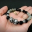 สร้อยข้อมือหินแท้ลาบราดอไลท์และนิลแท้ ตกแต่งด้วยชาร์มมังกรเงินแท้ Sterling Silver925 NSBL2255