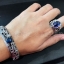 กำไลข้อมือเงินแท้ ลายมังกรฝังพลอยสีฟ้าไพลิน หลังเบี้ย Sterling Silver 925 NSBL2469