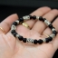 สร้อยข้อมือหินนิล แต่งด้วยหมุดเงินแท้ลายกราฟฟิก สลับรอบเส้น Onyx & Sterling Silver 925 NSSV2027