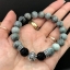 สร้อยข้อมือหินตาเหยียว ขนาด 10mm และชาร์มพิฆเนศ และตัวคั่น Sterling Silver 925 NSBL2210